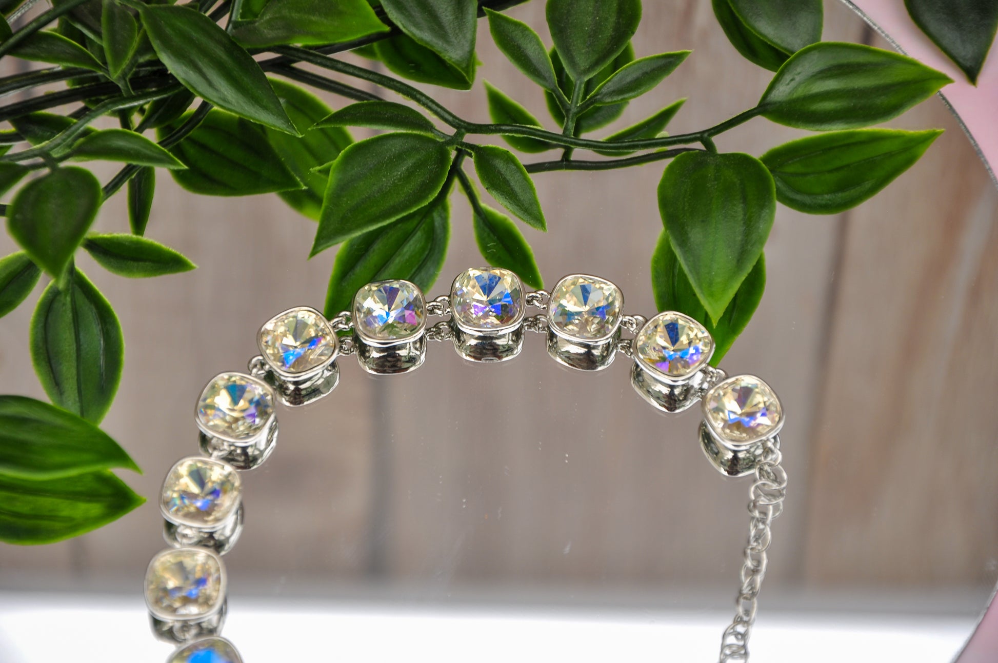 Elegant silver bracelet with sparkling crystal stones, perfect for any occasion.