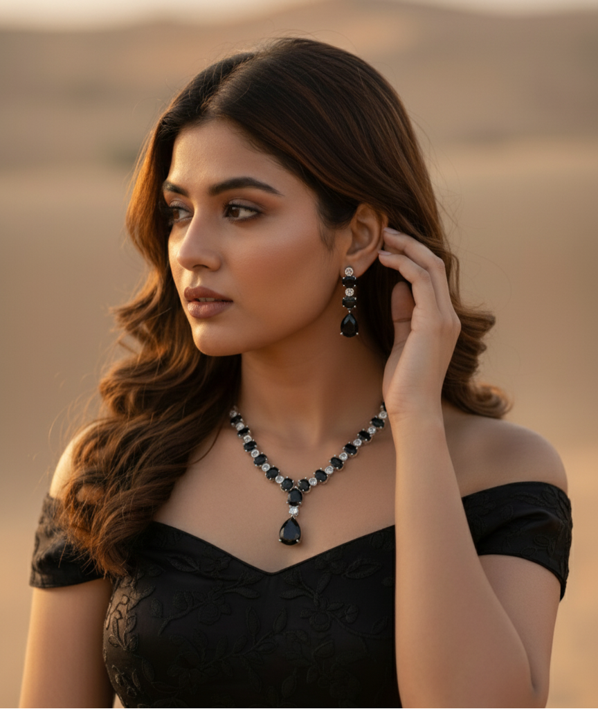 Elegant black jewelry set featuring a statement necklace and matching earrings, perfect for formal occasions.