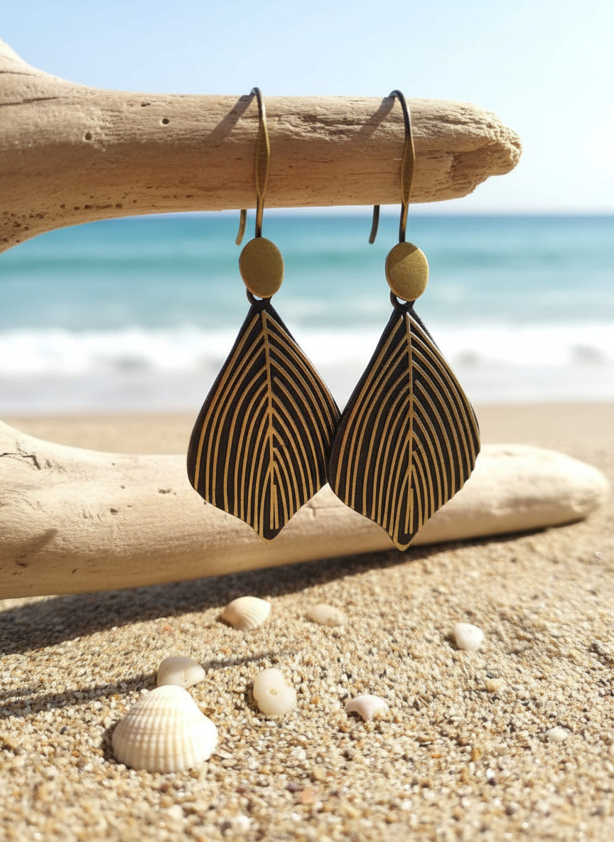 Boho leaf earrings in black and gold, made from lightweight materials, perfect for summer styles.