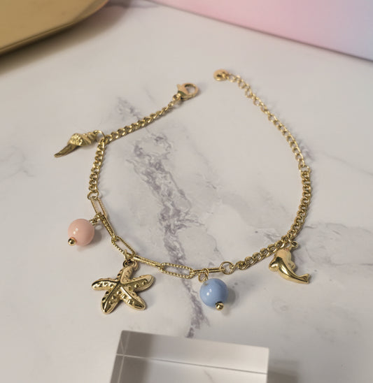 Gold-Plated Charm Bracelet with Playful Motifs
