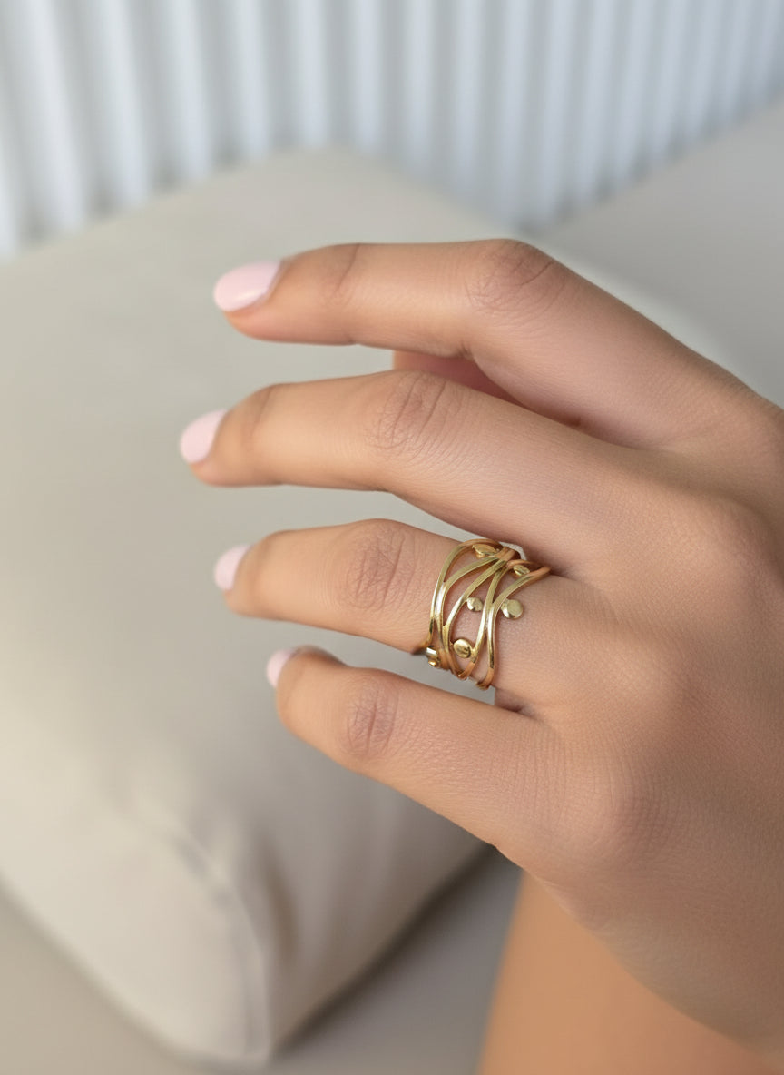 Gold stacked rings with elegant design, perfect for daily wear or special occasions.